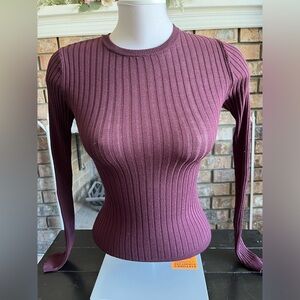 A purple long-sleeve top